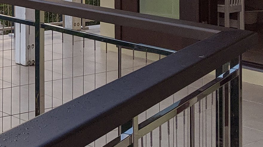 Modern patio vertical cable railing system.